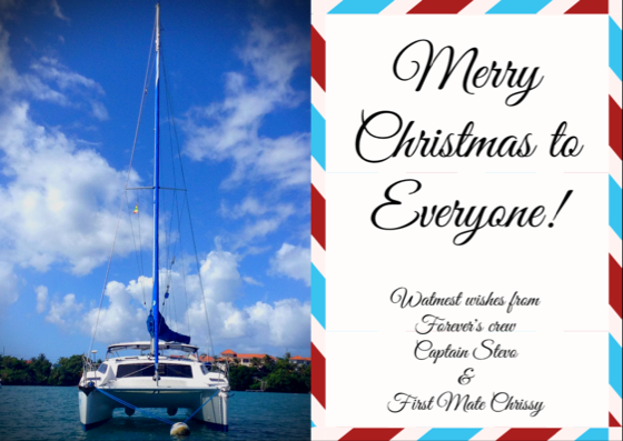 Christmas greetings, catamaran on mooring ball, blue sky, white clouds, Christmas cruising, island cruising, catamaran life, tropical Christmas