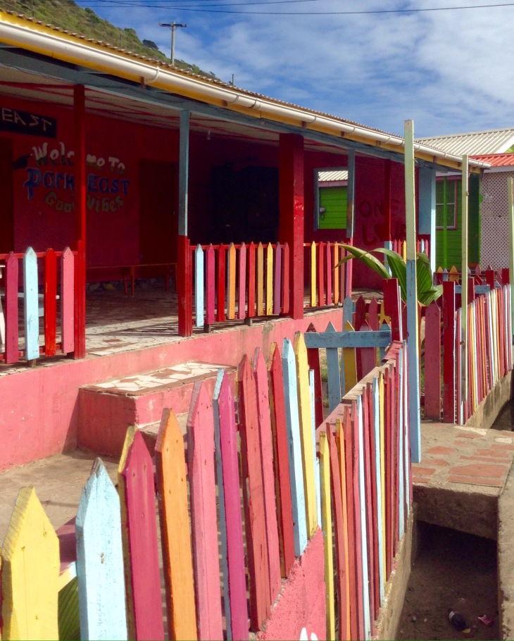 Colorful Caribbean gate, town, Clifton, Union island